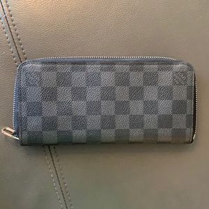 Black Louis Vuitton zipper wallet excellent used condition.